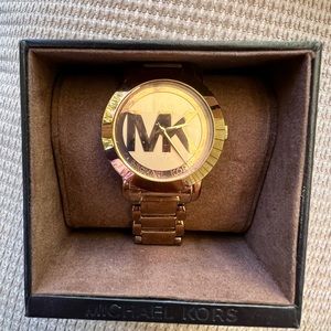 Michael kors stainless steel rose gold watch.